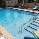 Sky Blue Finish - Original Deck - Meridian Cobalt Ceramic Tile - Custom Steps and handrail installation Sky Blue Finish - Original Deck - Meridian Cobalt Ceramic Tile - Custom Steps and handrail installation